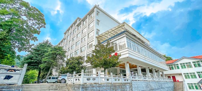 Zhengsheng Building Hotel Отели в г. Сишуй