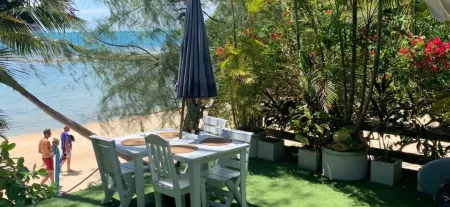 Coconut Beach Bungalows Отели рядом с достопримечательностью «Bottle Beach»