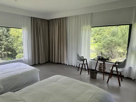 Muya Cangzhai Homestay Отели рядом с достопримечательностью «Lotus Sea»