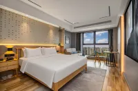 Ozz·nice4·千嶼S飯店(成都熊貓基地龍潭寺地鐵站店) 西南財經大學天府學院(成都東區)附近的飯店