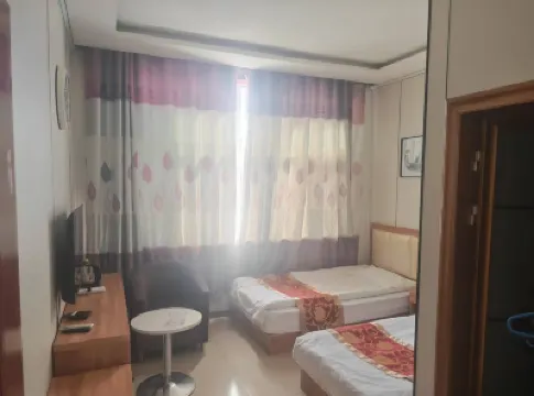 Zhengxiang Baiqi Weiye Business Hotel فنادق في 