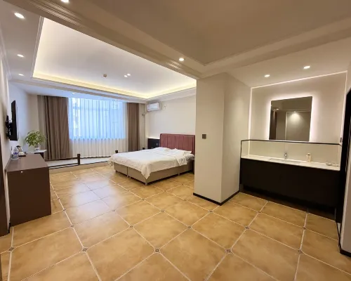 Tangla Town Holiday Hotel Hotel a Dehui