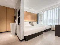 QiXi Hotel (HaXi Wanda Plaza High-speed Railway Station) Hotel dekat Stasiun Kereta Harbin Barat