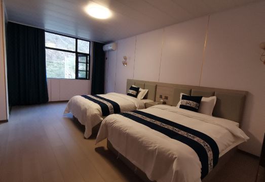 단바 Danba Xinxuan Homestay 2성급 호텔 객실