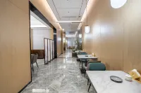 Yiliang Fei'er Lisi Hotel - servizio colazione