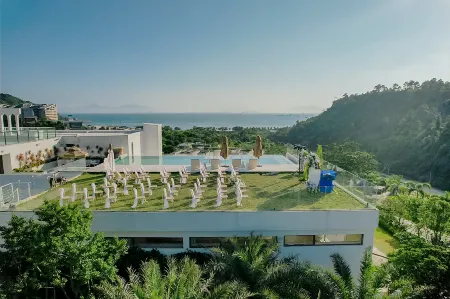 Jianshe Hotel Villa (Huidong Xunliao Bay Jiumingyuhai Branch) Отели рядом с достопримечательностью «Jinyintan Beach»