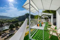 Shuangfeng Village Homestay (Moon Bay Scenic Area) - ที่มีบาร์