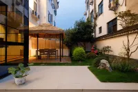 Floral Hotel·Dusk Yunxi Beauty hotel (Wuyuan Huangling Scenic Area Store) فنادق في شانغ راو