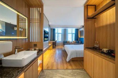 Lelan Exquisite Hotel (Xingyang High speed Railway West Station Branch) Отели рядом с достопримечательностью «Donglin Temple»