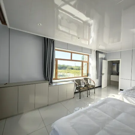 Fuyuan Zhejie Sister Homestay (Nangang Hezhe Ethnic Village)