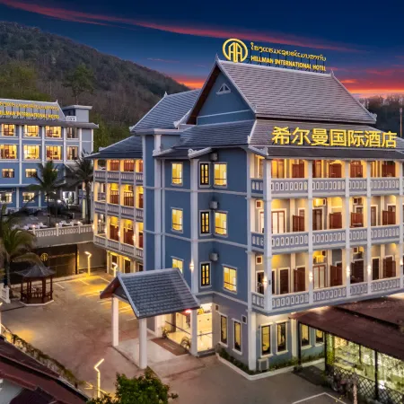 Hillman International Hotel Отели рядом с достопримечательностью «Ват Тат Луанг»