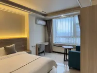 Long An Xin Yi Business Hotel conversion