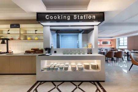 ECHARM Hotel Jiujiang railway station Wanda Plaza Отели рядом с достопримечательностью «Accounting and Auditing Institute， Jiujiang University»