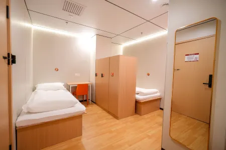 Zhuxiaoding Hotel (Beijing National Stadium-Bird's Nest Anzhen Hospital) Отели рядом с достопримечательностью «Dazhong Temple Ancient Bell Museum»