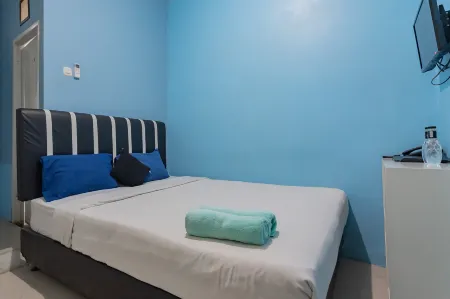 Jabrix Hotel Mitra RedDoorz Отели рядом со станцией Cikudapateuh Train Station