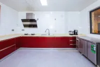 Anji Luohuaju Homestay - مطابخ