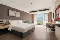 尚客優ホテル（普洱瀾滄ラフ族自治県人民医院） Mifengyan Viewing Point周辺のホテル