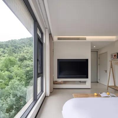 Living by the Mountain · Swimming Pool Family Vacation Boutique Stay Hoteles cerca de Xiaofeng Millennium Ancient City