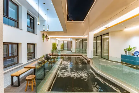 Zigong Jinhui garden hotel Отели рядом с достопримечательностью «Zigong Vocational and Technical College»