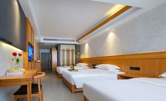 adjacent bathroom with a shower and toilet at Manyuan Resort Hotel