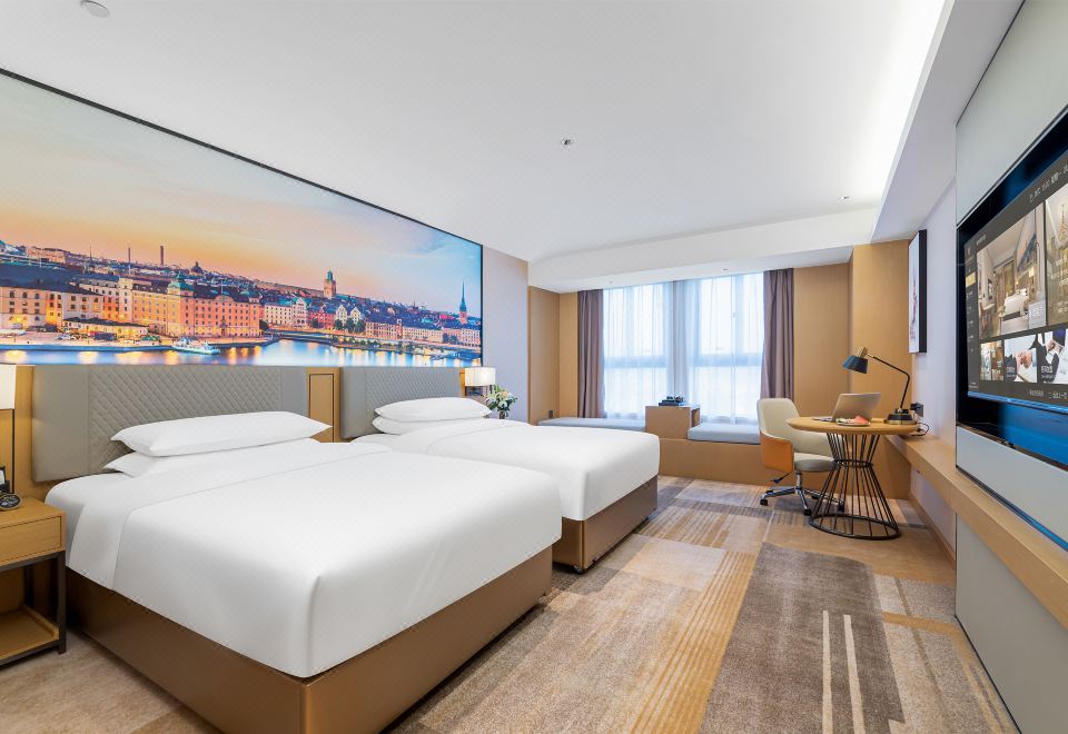 비엔나 인터내셔널 호텔의 깔끔한 객실 모습