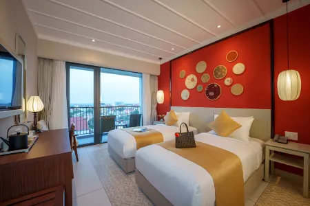 Cozy An Boutique Hotel Hoian Отели рядом с достопримечательностью «Это До Там Кван Пагода»