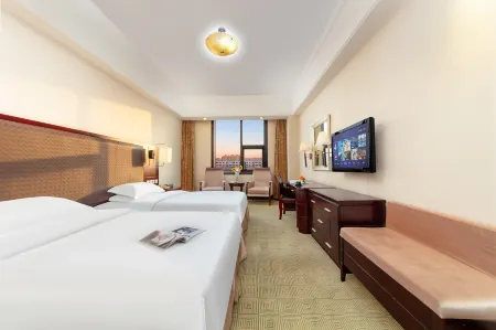 Hailian Water World Hotel (Sanmenxia Wanda Plaza) Отели рядом с достопримечательностью «Huanghe Forest Park»