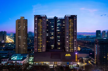 Meixi International Hotel Отели рядом с достопримечательностью «Zhang Zhongjing Memorial Temple»