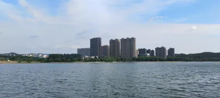 Yantai Baohua Mingdu Hotel Отели в г. Цися