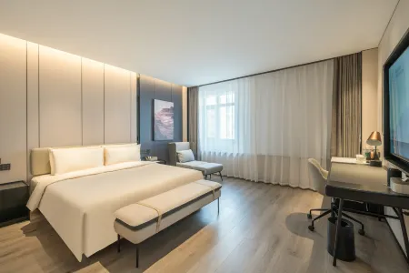 Jiamusi Zhongshan Street New Mate Atour Hotel