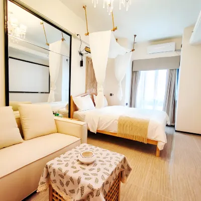 Quzhu Qingju Chain Apartments（Foshan Century Lotus Sports Center） โรงแรมใกล้สถานีซุ่นเต๋อเป่ย