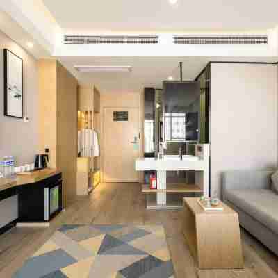 三葉草假日酒店（桂平興桂店） Rooms