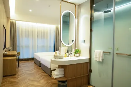 YENOM HOTEL Отели рядом с достопримечательностью «Tangdao Bay Coastal Park»