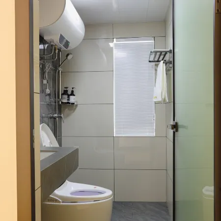 Aiqing Apartment Отели рядом с достопримечательностью «Большой рынок для общины»