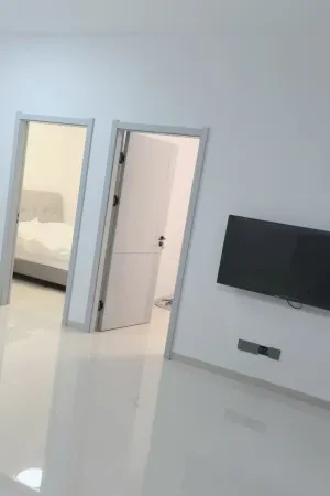 Longxing Business Inn Отели в г. Симэн