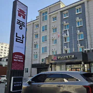 Pungnam Tourist Hotel Отели рядом с достопримечательностью «Рынок Намбу»