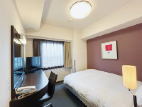 Hotel Route-Inn Hirosaki Ekimae فنادق في 