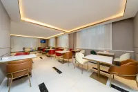 White Magnolia Business Hotel (Linxia Peony Square Branch)
