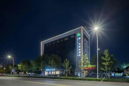 New Day Hotel (Wanda Branch, Siqian Street, Longwan Airport, Wenzhou) Отели рядом с достопримечательностью «Tianzhu Temple»