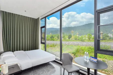 Qiduomeiyuan (Libo Xiaoqikong) Отели рядом с достопримечательностью «Wolong Pond»