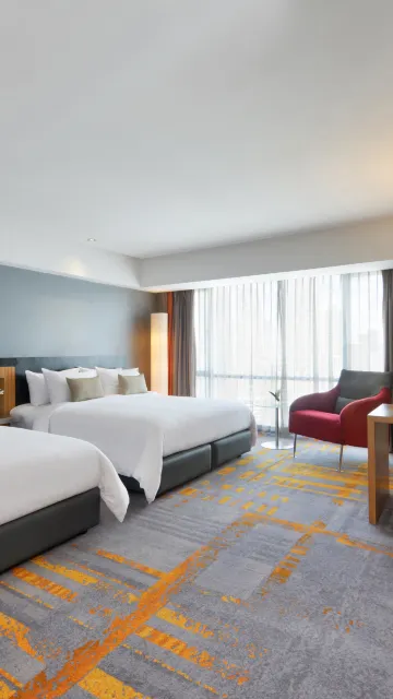 ห้องไตรเบกาดีลักซ์เตียงควีนไซส์ 2 เตียง