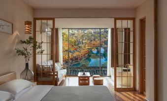 Valley Flowers Memory Phoenix Ancient City(Free Coffee &tea,Self-service Laundry &Drying)