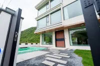 Yaoshan Xu · Natural Qixin | Minimalist Modern Qingning Boutique Stay - Beach