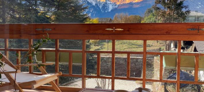 Meet the MountainInn in the distance Hotels in Luding County