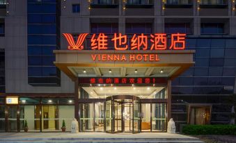 "the entrance of a hotel with a large sign that reads "" vienna hotel "" prominently displayed" at Vienna Hotel