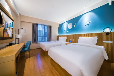 Crystal Orange Hotel (Harbin West Railway Station Wanda Plaza) Отели рядом с достопримечательностью «Heilongjiang University»