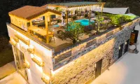 Taohuatan Tage Homestay Hotel dekat Zhangduzhen