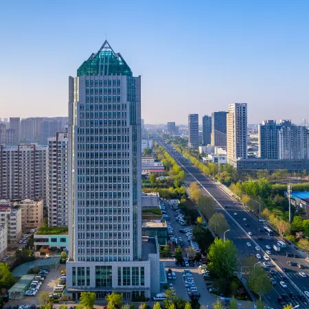 Qingdao Yunshu Nuanyi Apartment (Qianwan Port Logistics Park, Huangdao Free Trade Zone) Отели рядом с достопримечательностью «Китайская медицинская больница в новом районе западного побережья Циндао»