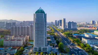 Qingdao Yunshu Nuanyi Apartment (Qianwan Port Logistics Park, Huangdao Free Trade Zone) Hotels near Chenguangyuan
