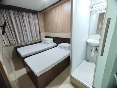 Kam Fu Guest House (Mongkok MTR Exit E1) فنادق في 